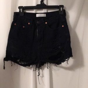 black distressed shorts